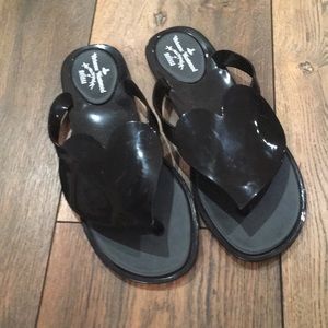 Black silicone flip flops